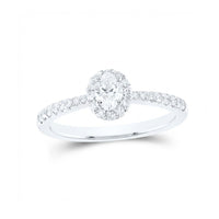 The 14k Gold Oval Diamond Halo Engagement Ring features an oval diamond center surrounded by a halo of sparkling diamonds, with additional stones accenting the band.