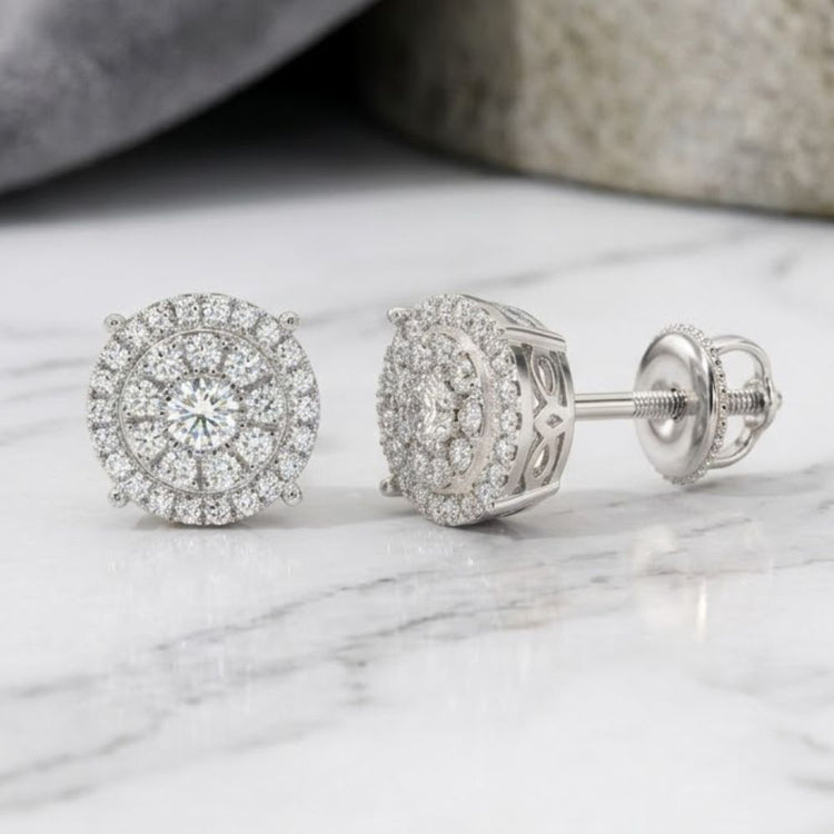 A pair of 14K Gold Round Diamond Cluster Earrings, totaling 5/8 carat, displayed on a white marble surface.