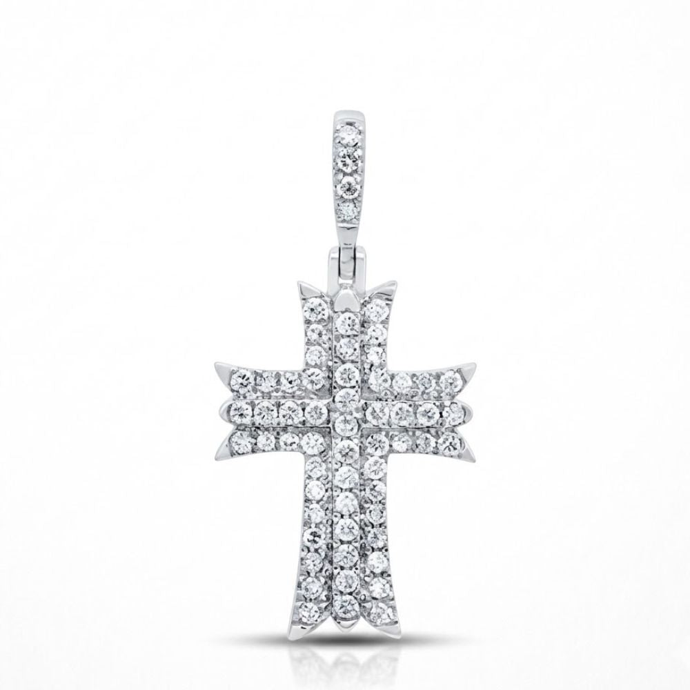 The 1/2 CT Diamond Cross Pendant features natural diamonds set in 10K white gold, offering a sparkling and elegant religious jewelry gift perfect for those seeking timeless style.