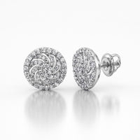 The 10K Gold 1/3 CTW Diamond Flower Stud Earrings feature a swirling round floral design set with natural diamonds, shown with one stud facing front and the other highlighting the secure screw-back closure.