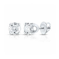 Add timeless elegance to any outfit with these 1/2CTW Unisex Diamond Solitaire Stud Earrings set in 14k yellow gold.