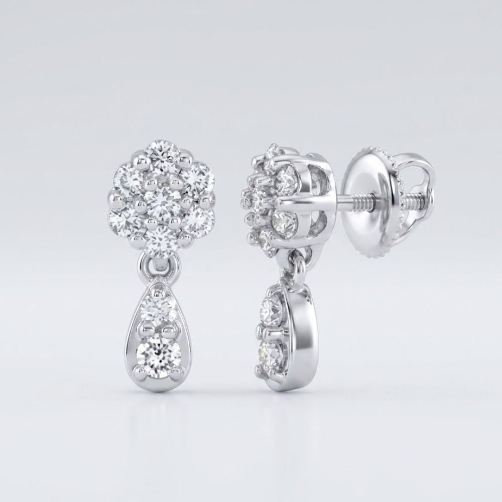 The 10k Gold Diamond Cluster Dangle Earrings 1/4 Cttw feature round-cut diamonds atop teardrop-shaped dangles with extra diamonds, displayed from both front and side views against a white background.
