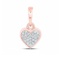 A 1/20CTW 10k gold heart pendant in yellow, white, and rose gold, adorned with sparkling natural diamonds at the center, shown on a plain white background.