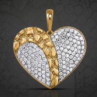 The 1 CTW Diamond Heart Pendant in Yellow Gold features a textured heart design adorned with sparkling natural diamonds, set against a rich, patterned yellow gold background.