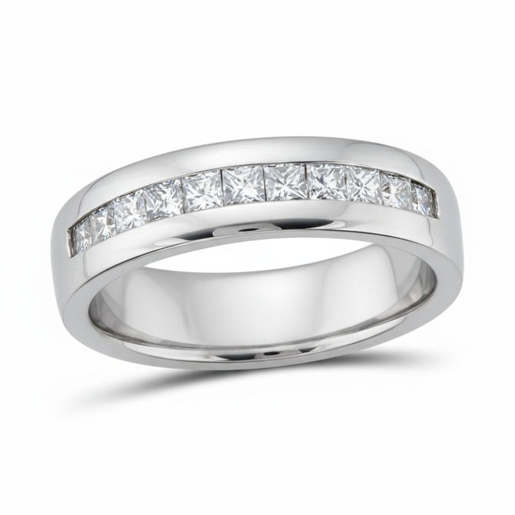 The 14k White Gold Princess Diamond Wedding Band 1/2 Cttw showcases square-cut diamonds channel-set in a sleek single row on a white background.