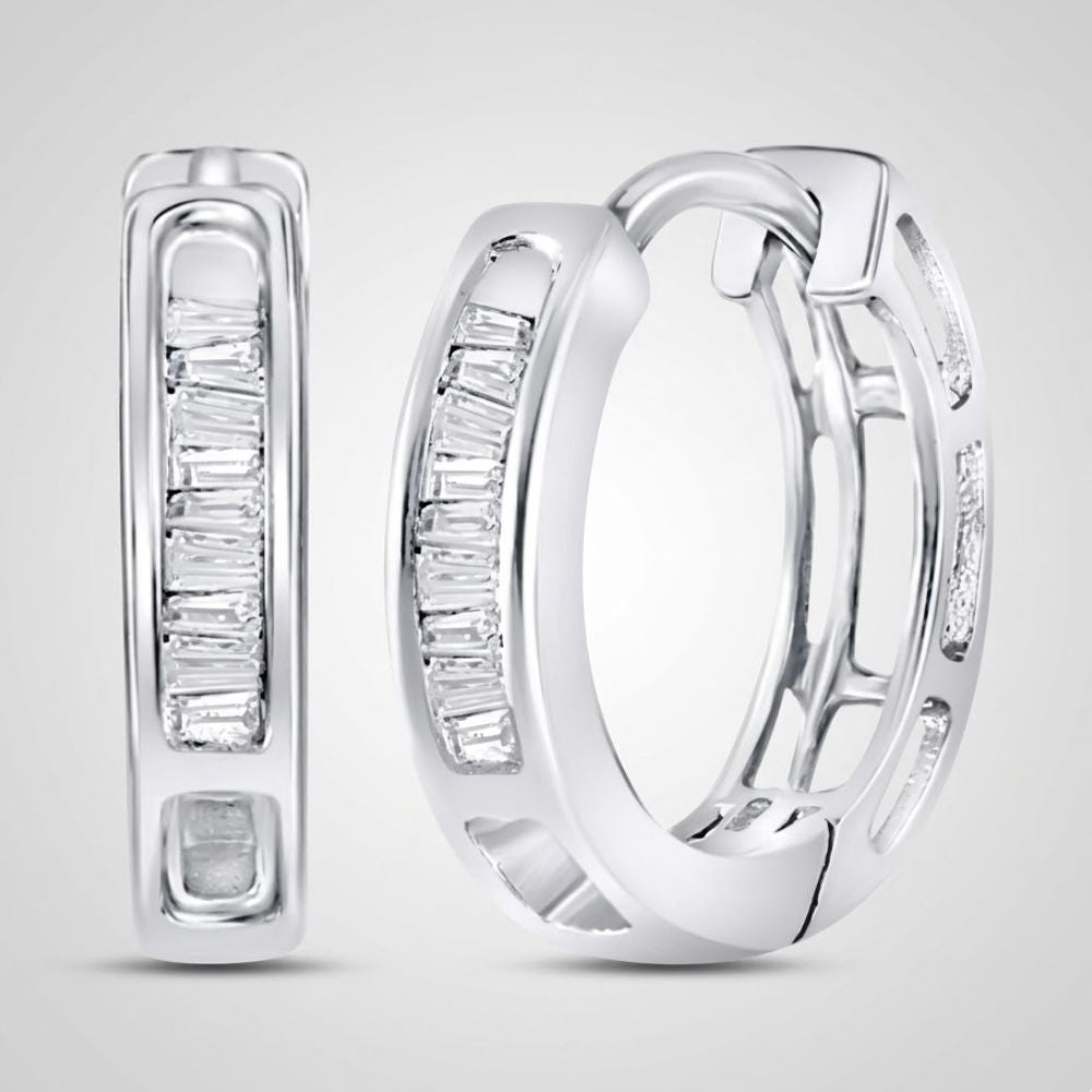 The 14k Gold Baguette Diamond Huggie Hoop Earrings 1/6 Cttw feature rectangular baguette-cut diamonds, shown from front and side views against a light gray background.