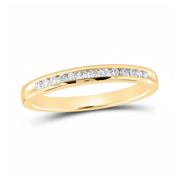 The 14k Gold Diamond Wedding Band from Nicole’s Dream Collection features a row of small round diamonds along the top, shown on a white background.