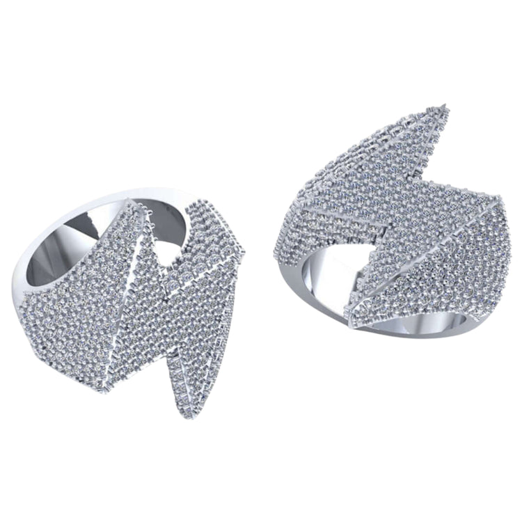 The Lightning Strike Diamond Ring – 4.40 CT Pavé Design features bold, angular zigzag patterns and lab-grown diamonds. Two silver rings are shown from different angles on a plain white background, making a striking statement set.