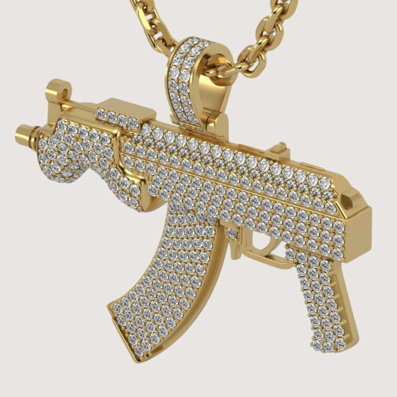 14k Gold Diamond Mini Draco Gun PendantDiscover the 14K Gold Diamond Mini Draco Gun Pendant. A bold and luxurious men’s gold pendant, featuring a mini Draco gun design with dazzling diamonds.