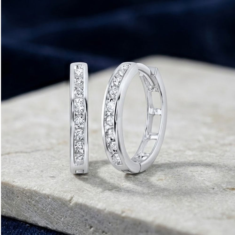 10K Gold Round Diamond Hoop Earrings 1/5 Cttw, featuring two round gold hoops each set with a row of small diamonds.