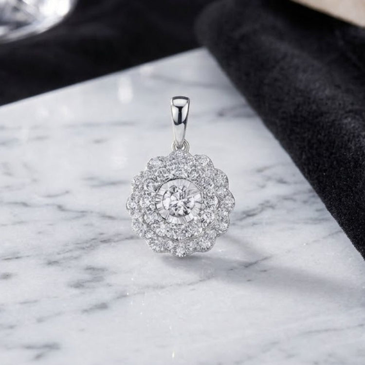 The 10k Gold Diamond Fashion Pendant 3/4 Cttw showcases a dazzling central round diamond encircled by two sparkling rows of smaller diamonds. Displayed on pristine white marble with a touch of black velvet, this chic pendant brings timeless elegance and radiant sparkle to any look.