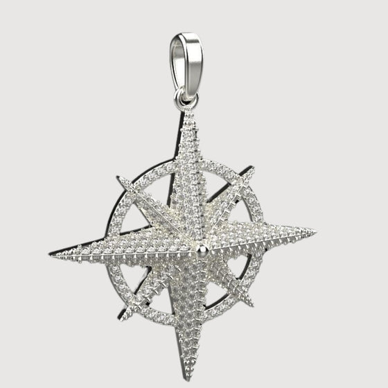 14k Gold Diamond Compass Star PendantEmbrace adventure with the 14K Gold Diamond Compass Star Pendant. Features a compass star motif in radiant 14K gold with sparkling diamond accents for timeless elegance.