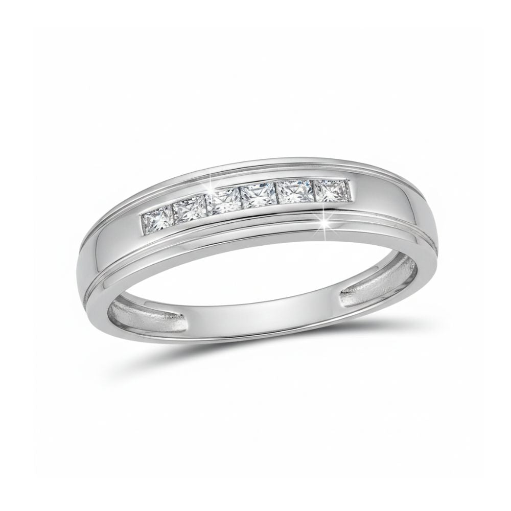 The 10k Gold Round Diamond Wedding Band – 1/12 Cttw features a sleek polished band set with sparkling round diamonds in a row, displayed against a plain white background.