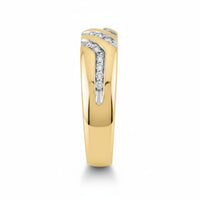 The 10k Yellow Gold Round Diamond Wedding Band (.03 Cttw) showcases a polished finish with diagonal white gold accents set with small round diamonds for a modern, elegant look.