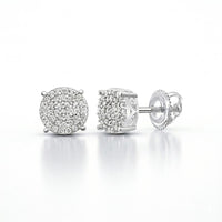 Sterling Silver Diamond Cluster Earrings 1/3 CTTW featuring clusters of sparkling diamonds set in sterling silver with secure screw-back fastenings, displayed on a white reflective surface.