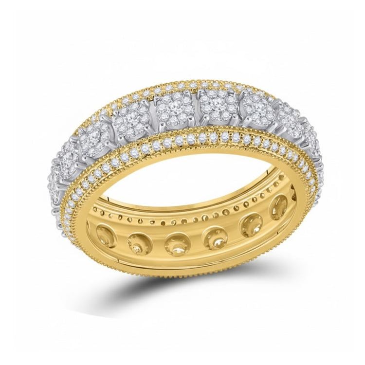 The 10k Yellow Gold Diamond Cluster Band Ring 1-1/4 Cttw features sparkling round diamonds set in intricate patterns along the band, accented with detailed beading and filigree for a timeless, elegant look.