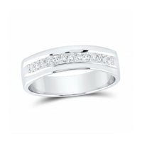The 14k Gold Single Row Diamond Wedding Band – 1/5 Cttw features channel-set round diamonds in a sleek gold band, sparkling elegantly across the top and showcased on a white background.
