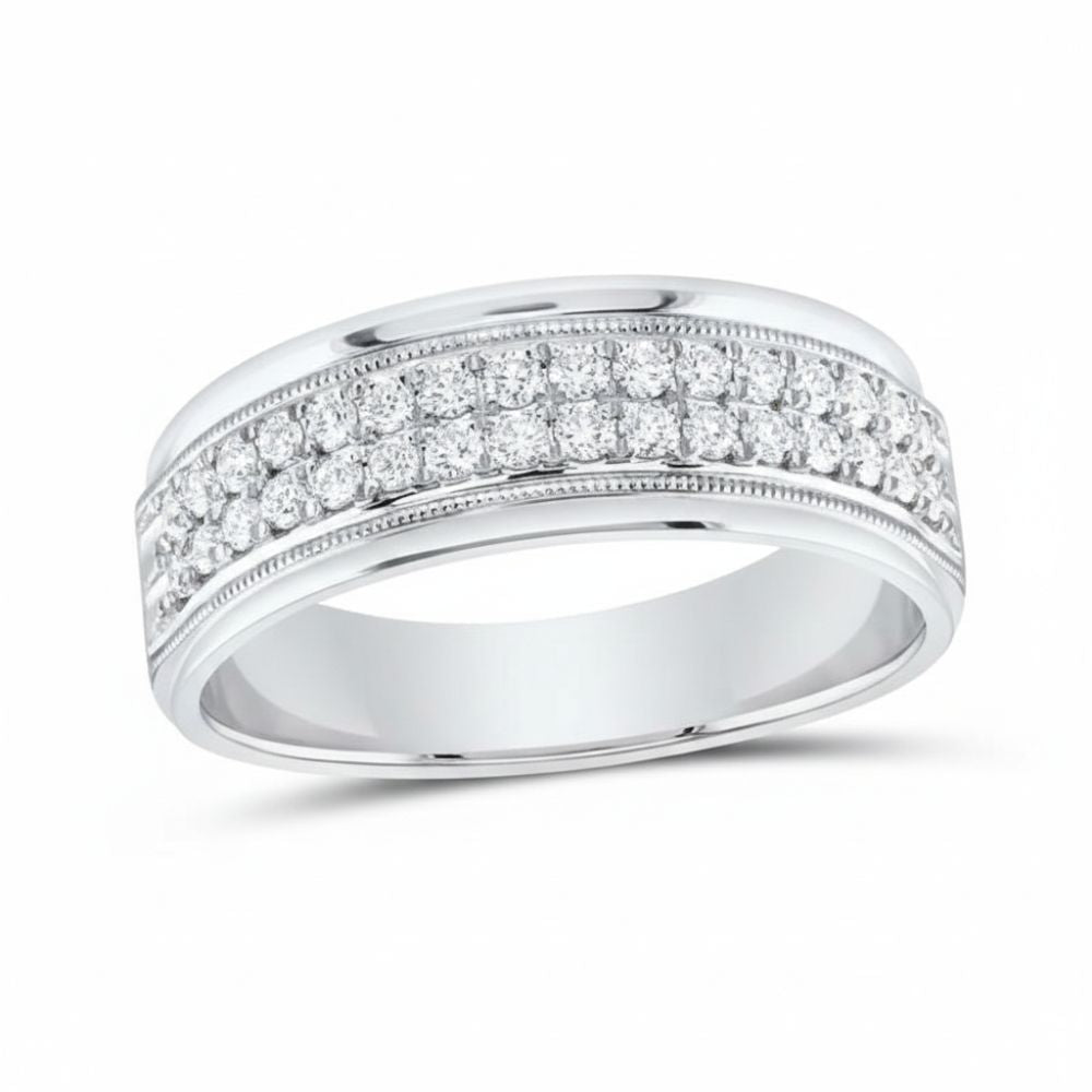 The 10k Gold Round Diamond Machine-Set Wedding Band 1/2 Ctw features two rows of round-cut diamonds across the top, a polished band, and detailed edges for an elegant, striking look.