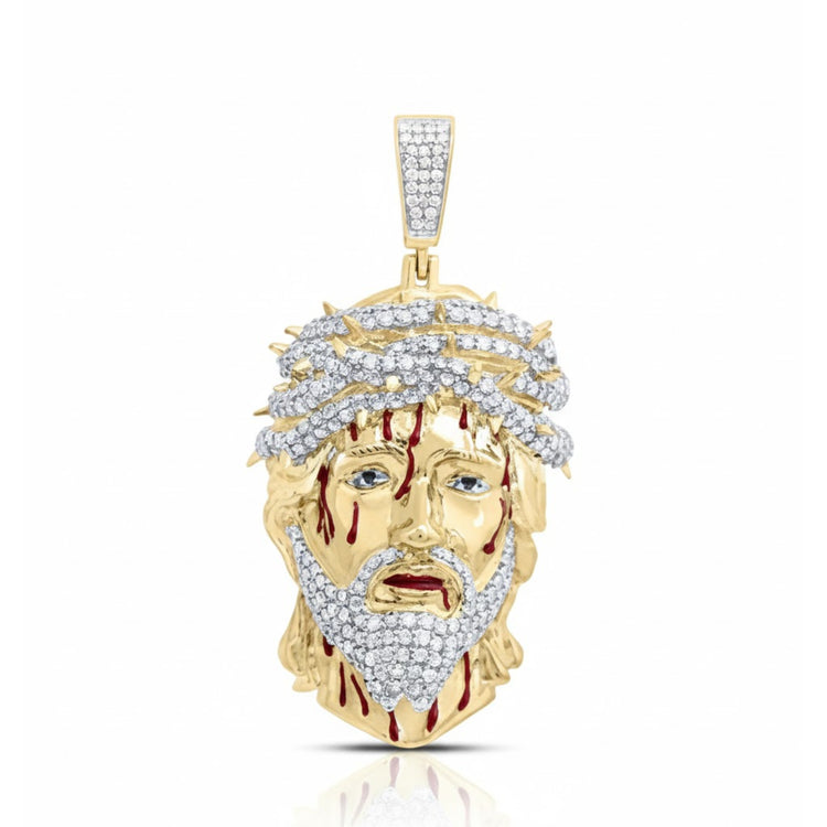 10k Gold Jesus Face Charm with 1.2CTW Diamonds features a bearded man's head with a crown of thorns, red blood-like accents, and sparkling stones on the thorns, beard, and hair—crafted in yellow gold.