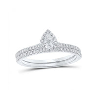 The 14k Gold Pear Diamond Halo Wedding Ring Set features a pear-shaped diamond halo atop a white gold band, paired with a matching diamond-studded ring, both beautifully displayed on a white background.