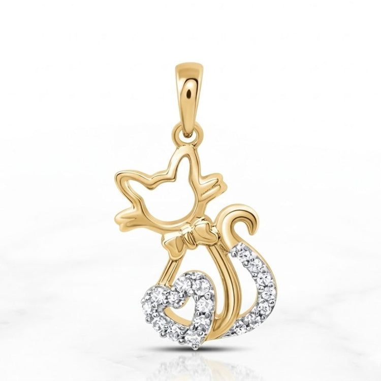 Delicate and elegant, the 1/10 CTW Diamond Heart Cat Pendant in 10K Gold features a heart-shaped tail accented with diamonds—a perfect piece of cat lover jewelry shown on a plain white background.