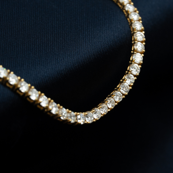 Shop 2mm Tennis Chain crafted in 14k Solid Yellow Gold. Featuring 6.72ct Lab-Grown Diamonds. - Goldzenn 