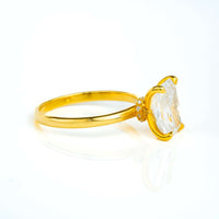 The 3.01ct Radiant Lab Diamond Solitaire Engagement Ring in 14k solid yellow gold features a large, clear radiant-cut lab diamond in a prong setting, shown from the side on a white background.
