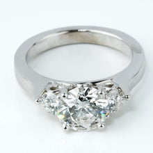  alt=" Discover the 3.08CTW Round Trilogy Lab Diamond Engagement Ring. A stunning women’s engagement ring featuring lab-grown diamonds in a 14K white gold band. "