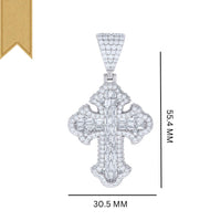 The Silver 3.23 CTW Baguette Moissanite Cross Pendant, crafted from 925 sterling silver and accented with sparkling diamonds and VVS moissanite (55.4 x 30.5 mm), is showcased on a white background with a gold ribbon in the top left corner.