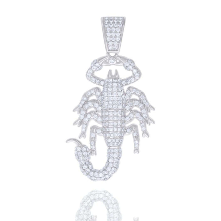 The Silver Moissanite Scorpio Charm Pendant features a scorpion design in sterling silver, detailed claws and tail, and is adorned with sparkling moissanite stones, shown elegantly on a white background.