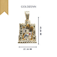 The St. Barbara Castle Shaped Pendant is crafted in 10k solid gold, featuring a detailed religious figure with a red gem, sunburst background, and "GOLDZENN" above. It measures 49.64 mm tall by 27.18 mm wide.