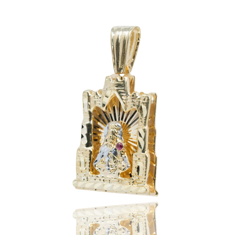 The St. Barbara Castle Shaped Pendant – 10k Gold features a detailed figure with a radiant background and a red chest accent, all set in an ornate frame. This men's religious jewelry is shown on a white background.
