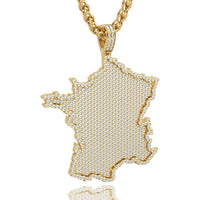 The 14k Gold France Flag Pendant with Lab Diamonds features a map-shaped design sparkling with lab diamonds, capturing the essence of French flag jewelry on a crisp white background.