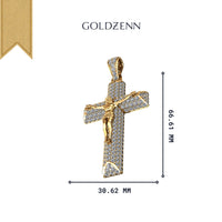 A 14K Gold Diamond Crucifix Pendant featuring a detailed Jesus figure, gold and silver tones, and shimmering stones. Measuring 66.61 mm by 30.62 mm, "GOLDZENN" is written above the pendant.