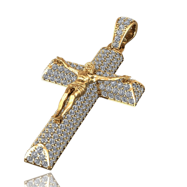 The 14K Gold Diamond Crucifix Pendant showcases a detailed gold Jesus figure on a cross, set with sparkling clear stones against a white background—an elegant piece of diamond jewelry.