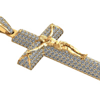 The 14K Gold Diamond Crucifix Pendant features a detailed gold figure of Jesus and is encrusted with small diamonds, showcasing the sparkling craftsmanship of this fine gold diamond jewelry.