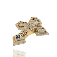 The Diamond Jesus Head Pendant with sapphire and ruby accents is crafted in 14K gold, featuring intricate designs and encrusted with gemstones, shown on a white background.