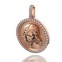 The 14K Gold Diamond Jesus Face Round Pendant in rose gold showcases a detailed bearded man with a crown of thorns, surrounded by sparkling diamonds for an elegant finish.