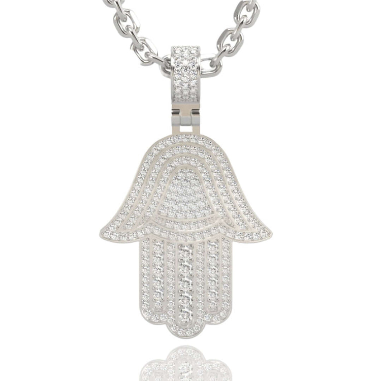 The 14k Gold Hamsa Hand Pendant with Diamonds shines on a matching chain, its elegant design displayed against a white background.