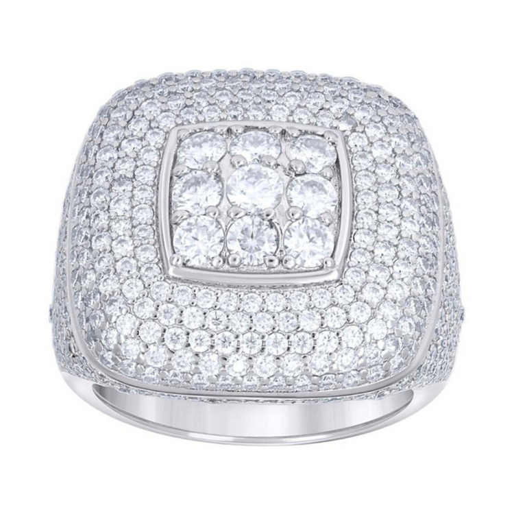 The Silver Moissanite Square Head Ring features a sterling silver band with a square head, adorned with sparkling moissanite stones and a raised cluster at the center for a luxurious look.