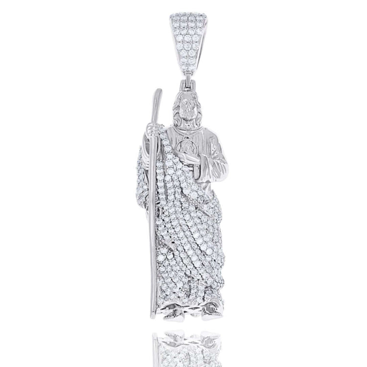 The 925 Silver Moissanite St. Jude Charm Pendant features a robed figure with staff, adorned with VVS moissanites on the robe and bail, crafted from hypoallergenic 925 sterling silver and shown on a white background.