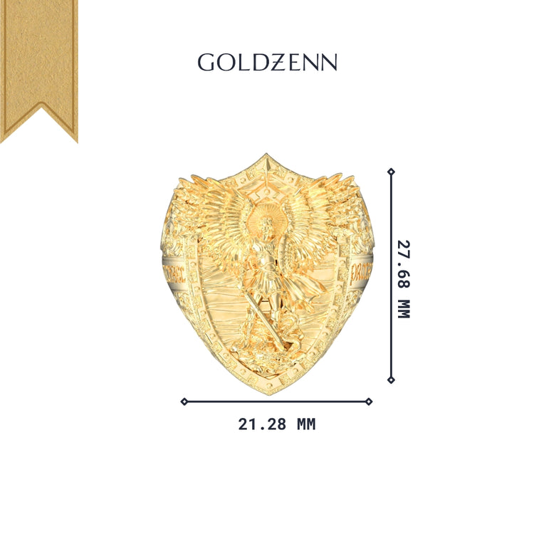 A gold shield-shaped pendant, 21.28 mm wide by 27.68 mm tall, featuring an angel design inspired by the Gold Archangel Michael Ring with Dragon. "GOLDZENN" appears at the top center with a gold ribbon in the top left corner.