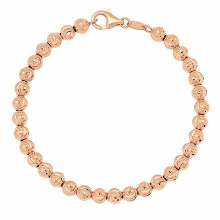 The Rose Gold Bead Bracelet - 4 mm Moon Cut is crafted in 14k rose gold, featuring polished round beads in a single strand and secured with a lobster clasp.