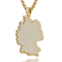 The 14k Gold Germany Map Pendant with Diamonds features a map-shaped design in 14K gold, accented with diamonds and suspended from a thick gold chain—a stylish piece that honors heritage.