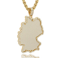 The 14k Gold Germany Map Pendant with Diamonds is a stylish gold chain necklace featuring a Germany map accented with clear stones for standout sparkle.