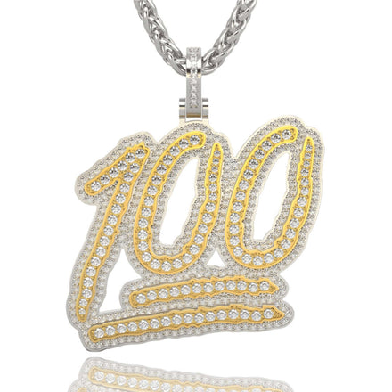 A 14k two-tone gold '100' emoji pendant with diamonds in a handwritten style, outlined in yellow gold, hangs from a twisted silver chain.
