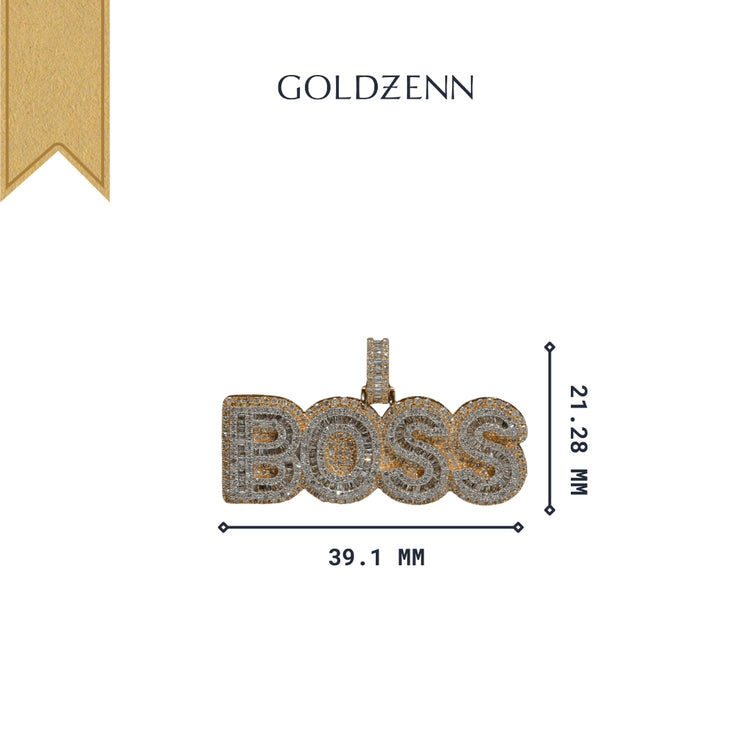 The Boss Diamond Pendant - 14k Yellow Gold, adorned with natural diamonds, measures 39.1mm wide by 21.28mm tall. Featuring the GOLDZENN brand above and a gold ribbon accent, it embodies refined elegance for any occasion.