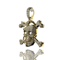 The 14K Gold Diamond Pirate Skull Pendant features diamond accents and a top loop for hanging. Its highly reflective gold finish shines brilliantly, making it an eye-catching accessory.