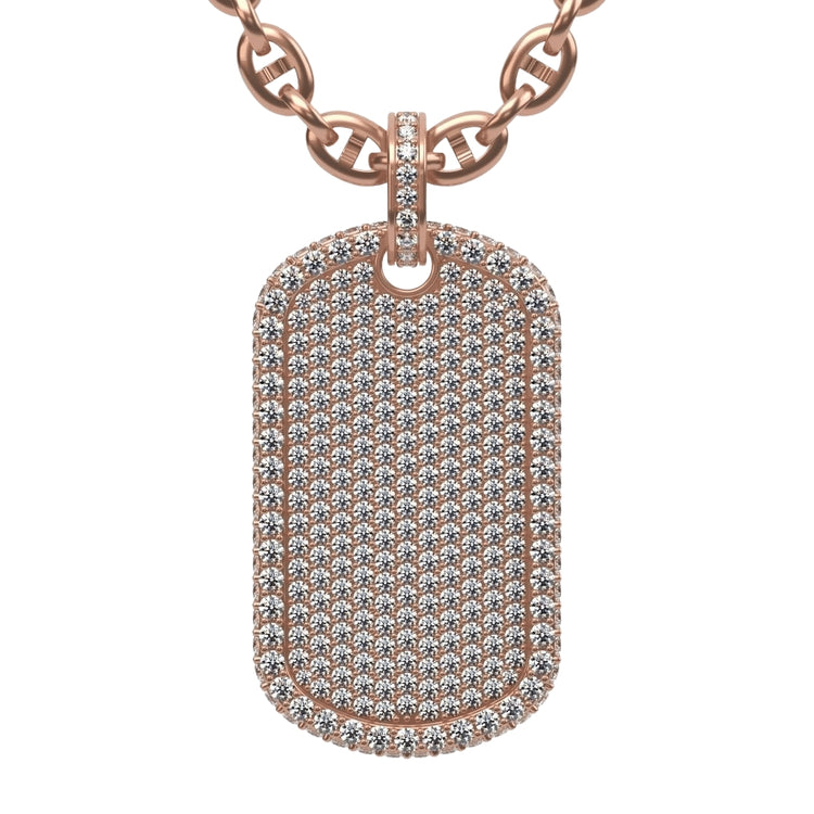 The Diamond Dog Tag Pendant – 14K is a rose gold necklace featuring a rectangular pendant encrusted with rows of sparkling white diamonds on its surface and edges.