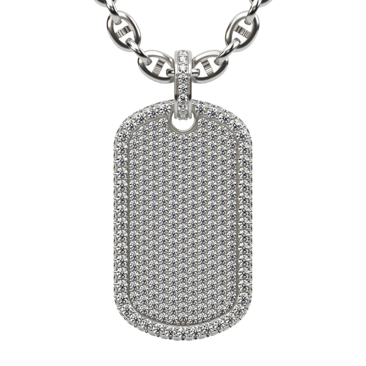 The Diamond Dog Tag Pendant – 14K features a polished, elegant design with rounded edges and sparkling diamonds, hanging from a thick silver chain with interlocking links.